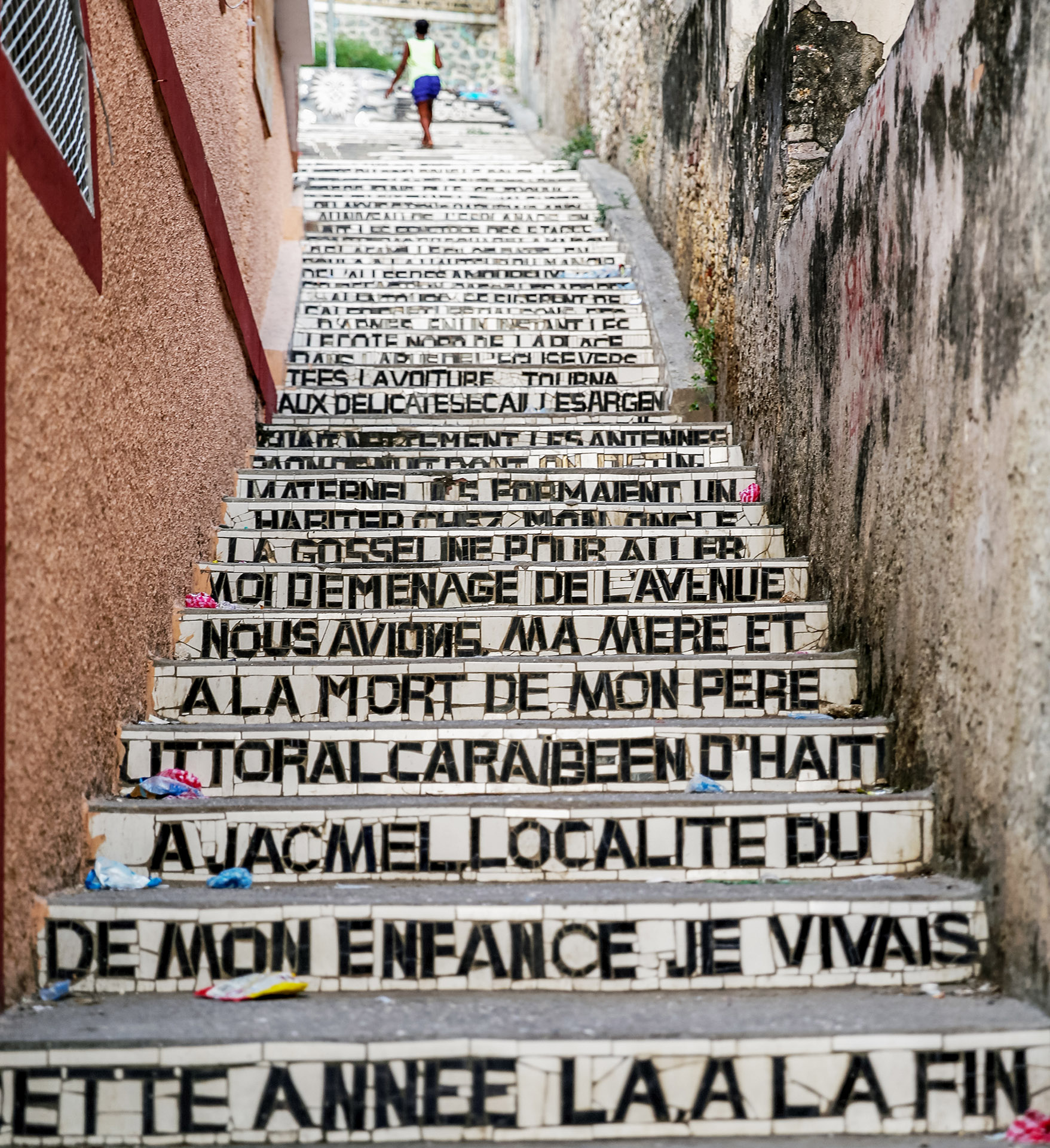 Stairs with a mosaic of words in Jacmel, Haiti