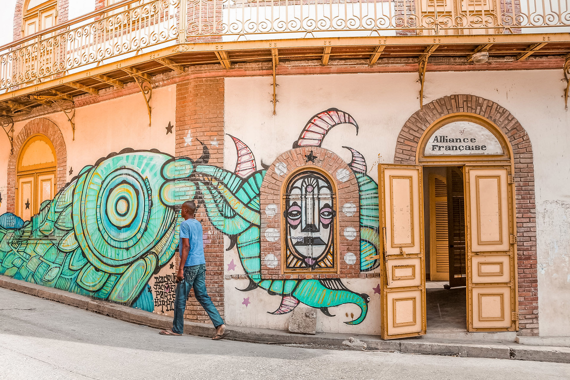 Street art on the outside of the Alliance Francaise hotel and restaurant in Jacmel, Haiti