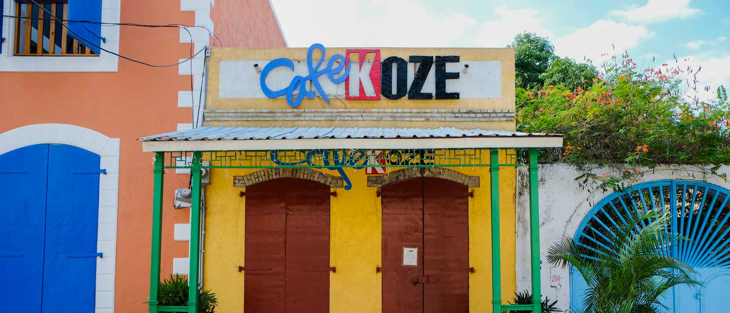 The colorful exterior of Cafe Koze in Jacmel, Haiti