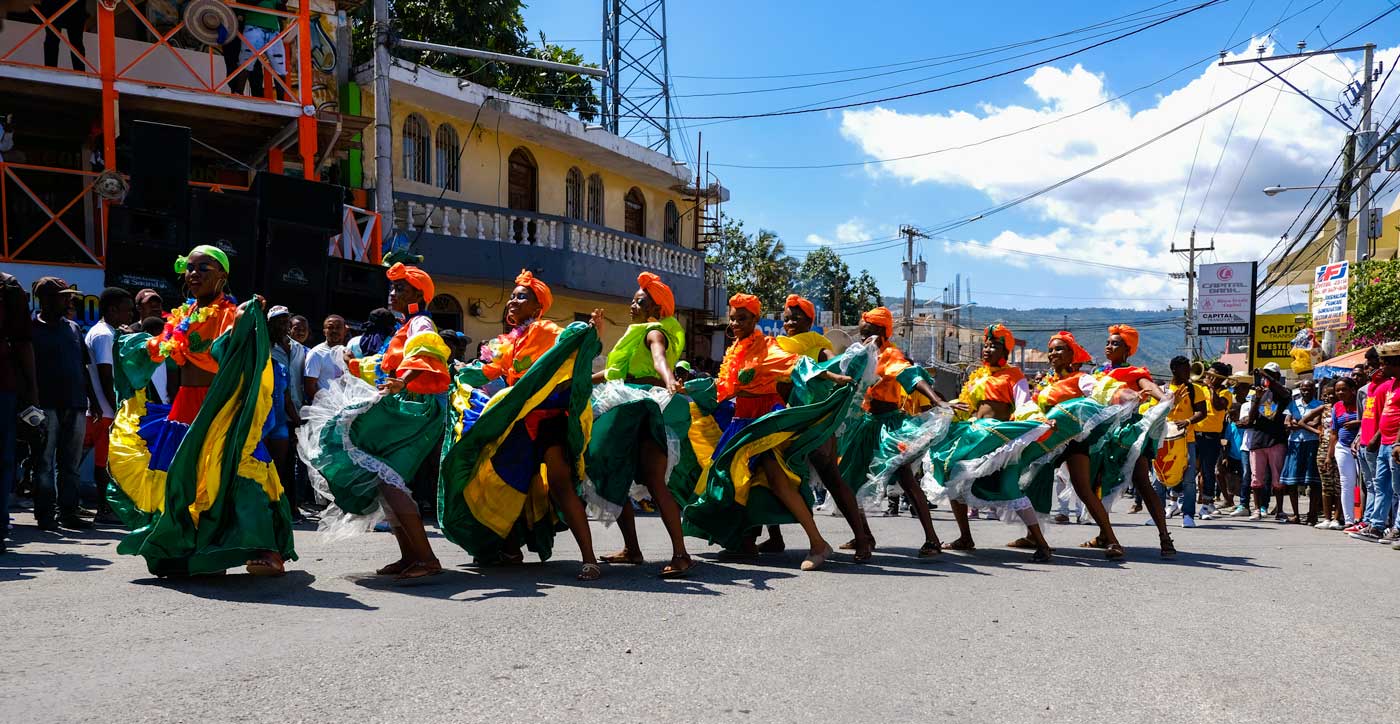 A line of dancers perform at the carnival in Jacmel, Haiti