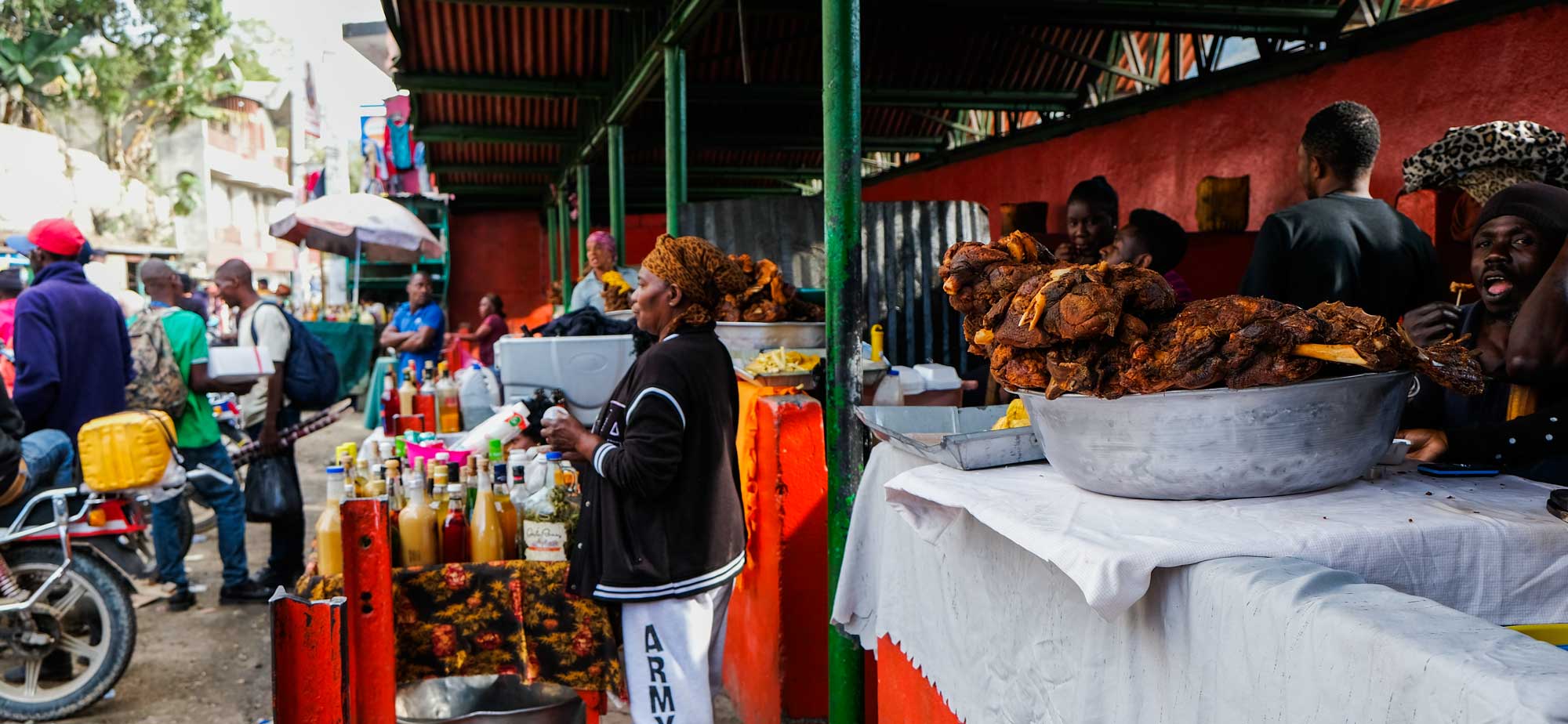 Vendors selling street food in Fermathe, Haiti