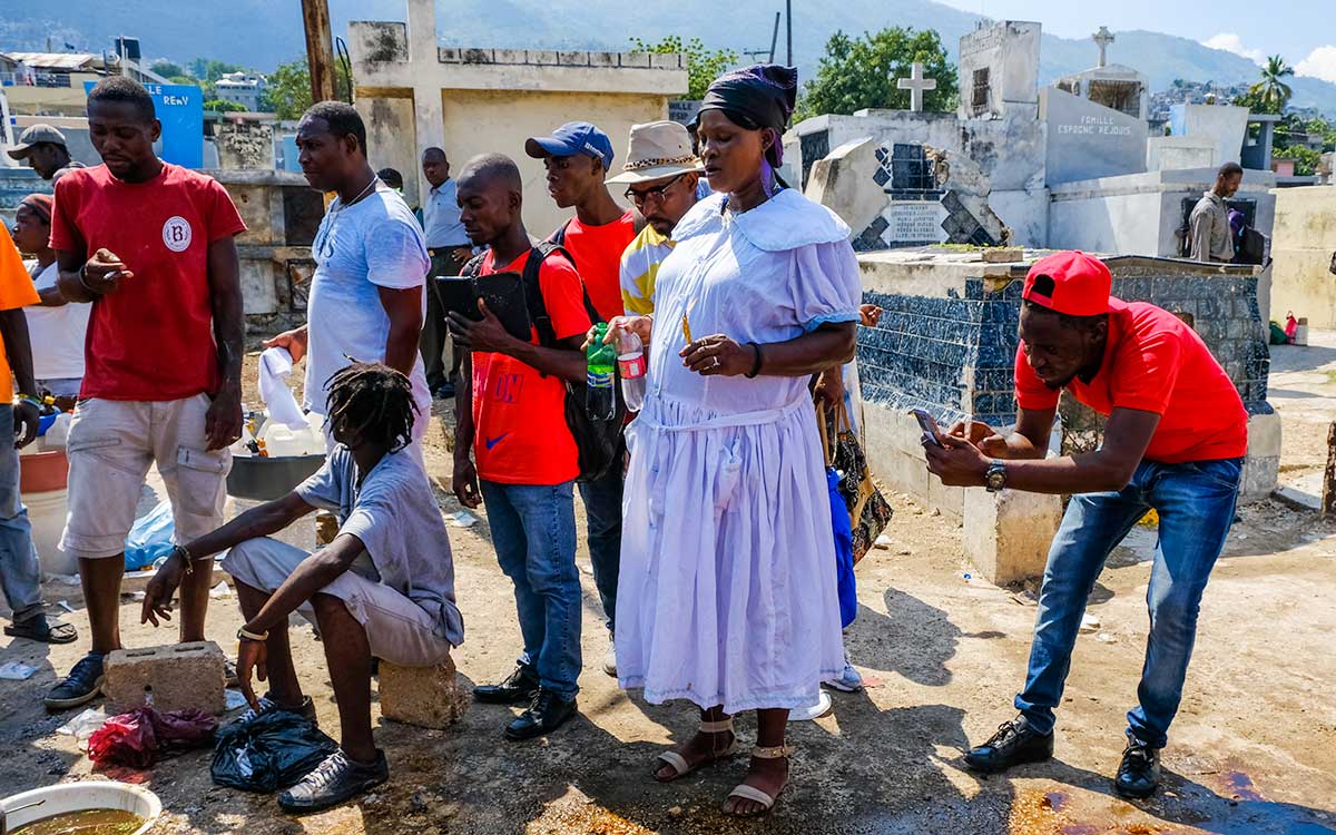 haitians celebrating fet gede at cemetery in port-au-prince