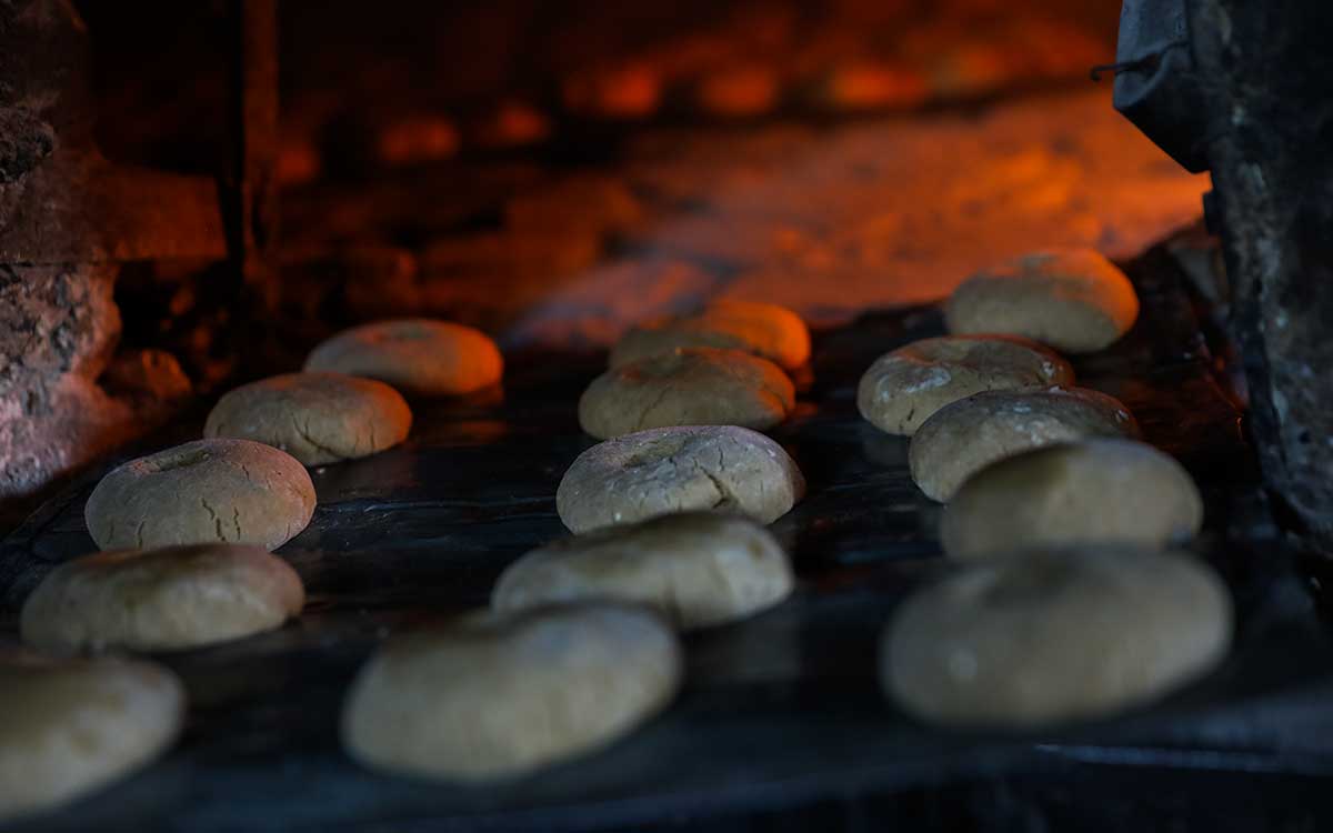 haitian konparet cakes being baked in oven