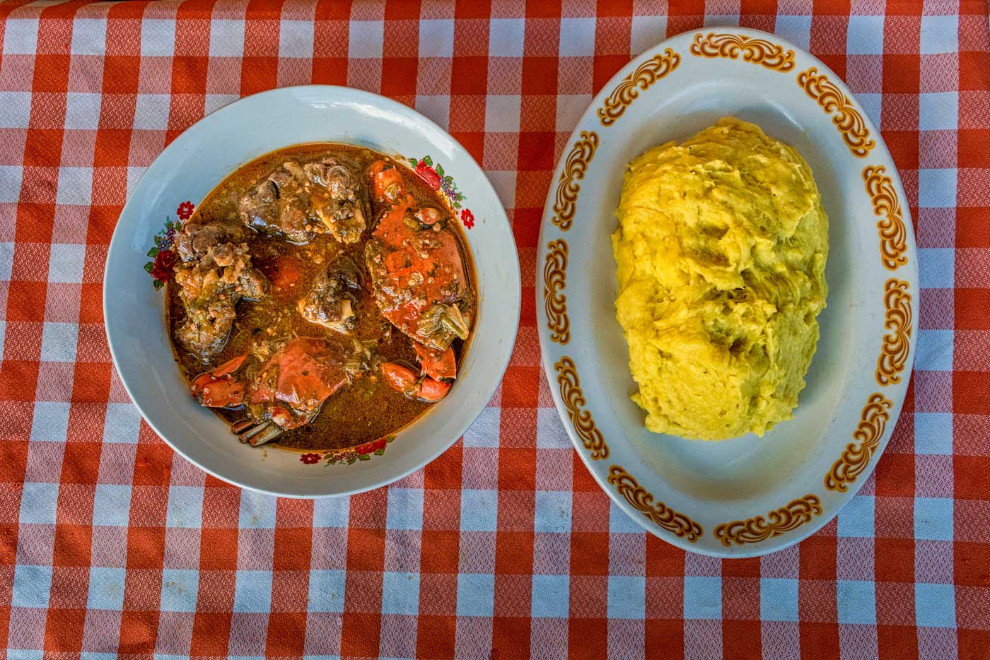 two plates with mashed breadfruit and haitian tonmtonm