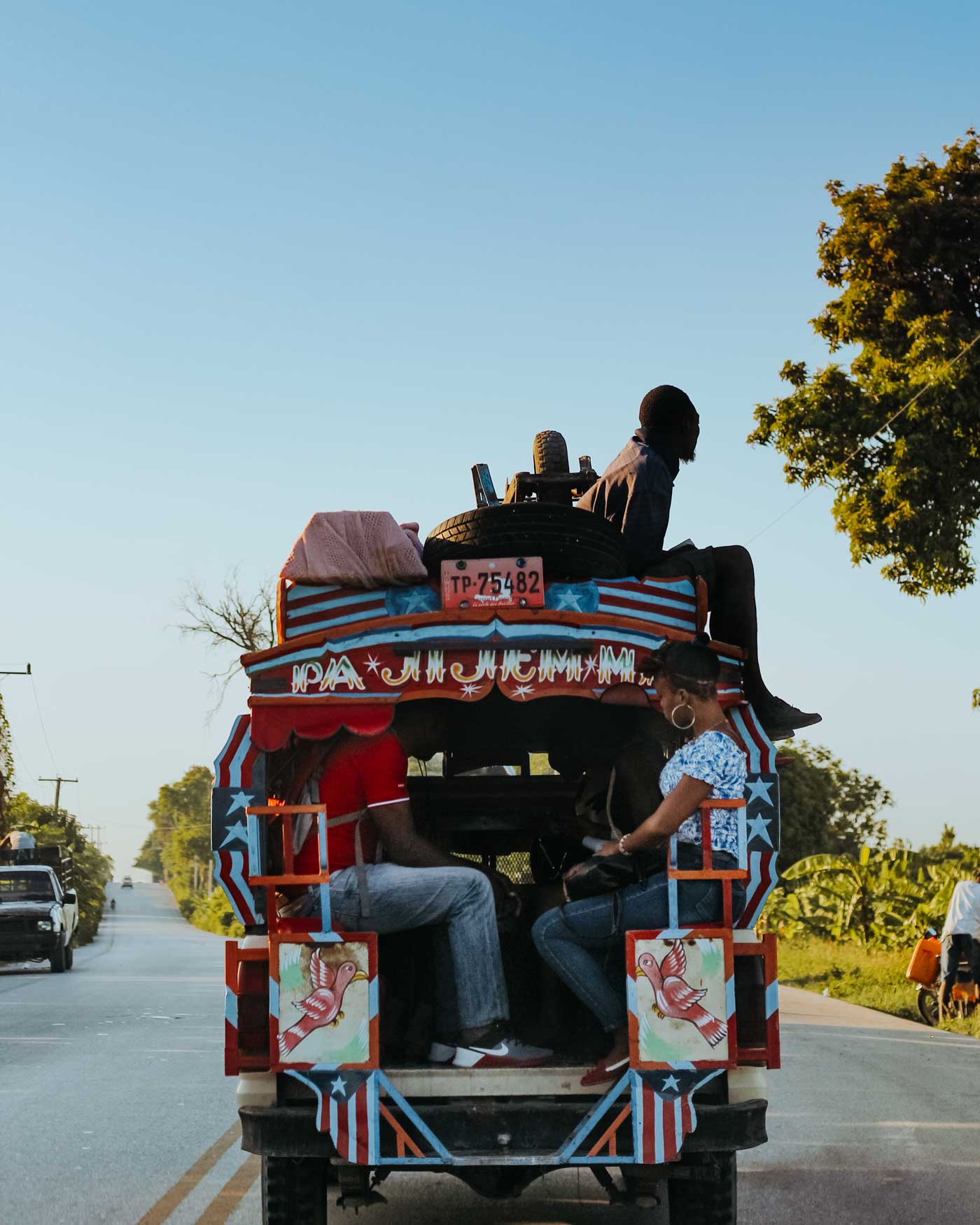 colorful haitian public bus with passangers